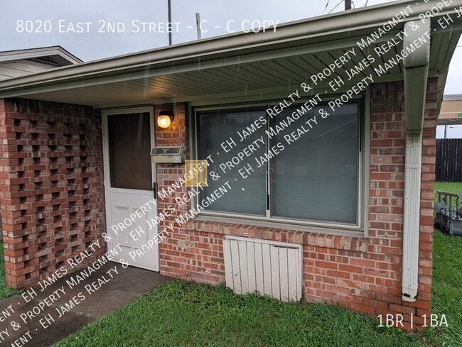 property at 8020 E 2nd St S
