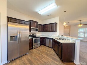5790 Corkscrew Ct in Pace, FL - Building Photo - Building Photo