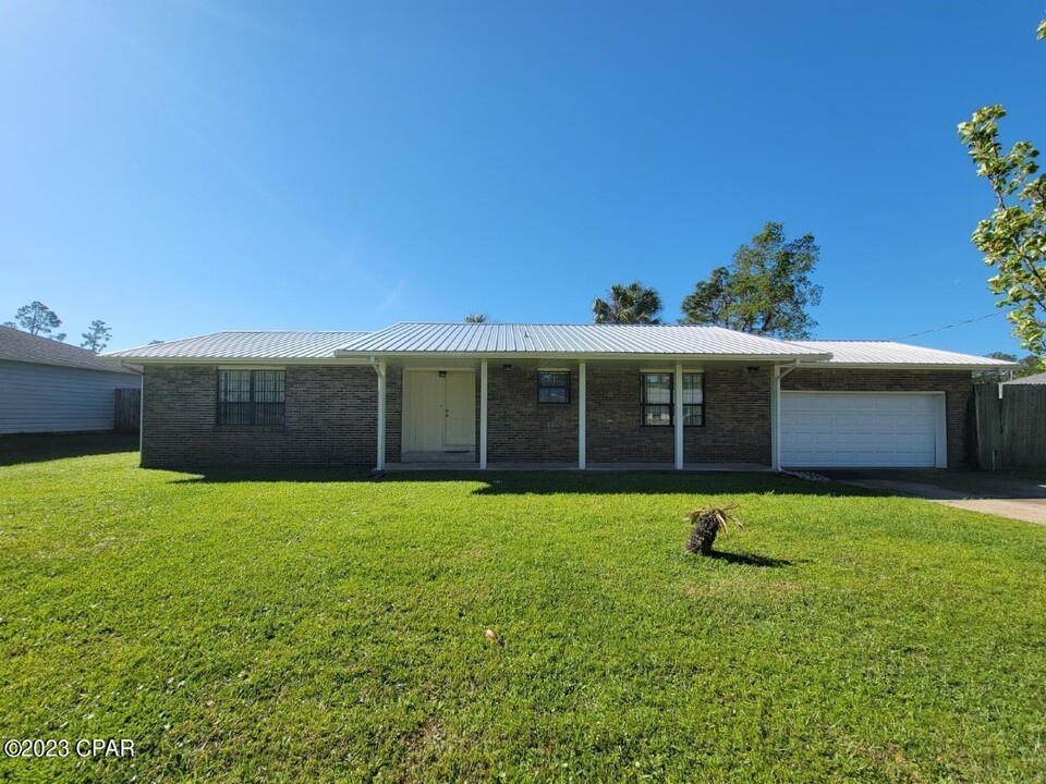 9121 Abba Ln in Panama City Beach, FL - Foto de edificio