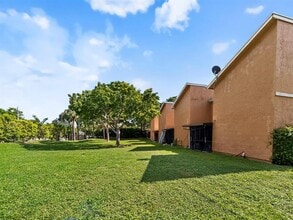 8009 NW 71st Ct in Tamarac, FL - Building Photo - Building Photo