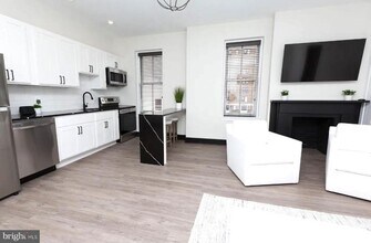 938 N Calvert St in Baltimore, MD - Building Photo - Building Photo
