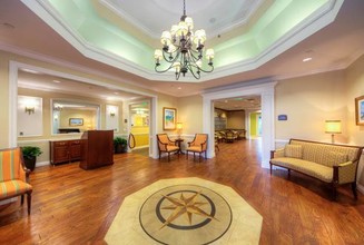 Aston Gardens At The Courtyards Senior Living in Sun City Center, FL - Building Photo - Building Photo