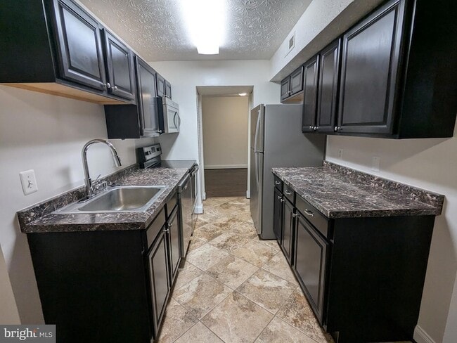 7931 Mandan Rd, Unit 623 in Greenbelt, MD - Building Photo - Building Photo