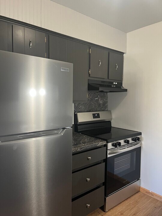 716 Rhodes St, Unit 3 in Pinconning, MI - Building Photo