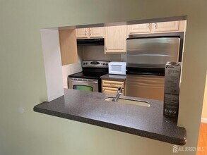 911 Ravens Crest Dr, Unit 911 in Plainsboro, NJ - Building Photo - Building Photo