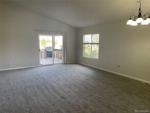 5241 Helena St, Unit 3-E-204 in Denver, CO - Building Photo - Building Photo