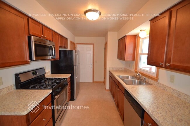 property at 5900 Aquila Ave N