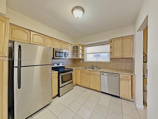 property at 8570 NW 11th St