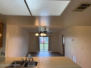 1710 University Ln-Unit -406 in Cocoa, FL - Building Photo - Building Photo