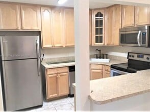 5930 Whispering Pine Way in Greenacres, FL - Building Photo - Building Photo