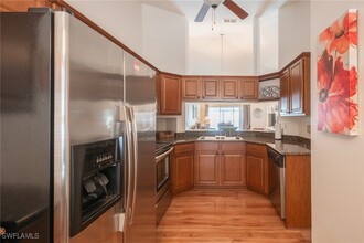 1300 Misty Pines Cir in Naples, FL - Building Photo - Building Photo
