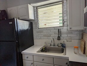 1063 Lower Main St-Unit -401 in Wailuku, HI - Building Photo - Building Photo