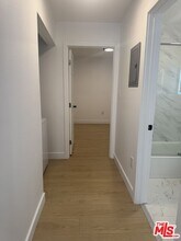 4013 Walton Ave in Los Angeles, CA - Building Photo - Building Photo