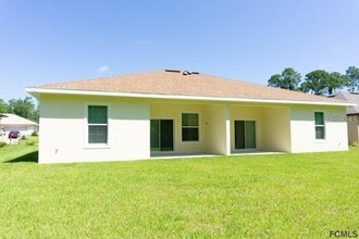 64 Farmsworth Dr in Palm Coast, FL - Building Photo - Building Photo