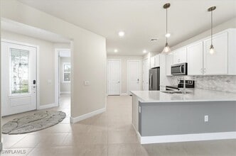 5935 Mayflower Way in Ave Maria, FL - Building Photo - Building Photo