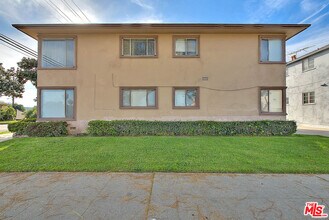 3701 Coliseum St in Los Angeles, CA - Building Photo - Building Photo