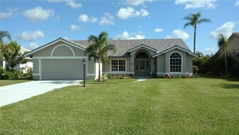 22757 Caroline Dr in Estero, FL - Building Photo