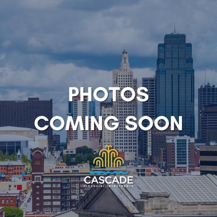 1009-1015-1015 Cambridge Meadows Ct in Belton, MO - Building Photo