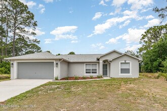 2208 Ravel Rd SE in Palm Bay, FL - Building Photo - Building Photo
