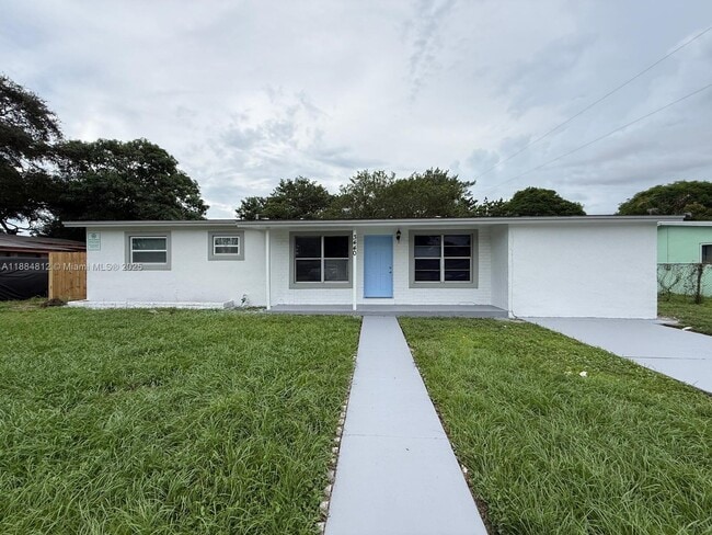 property at 3440 NW 4th St