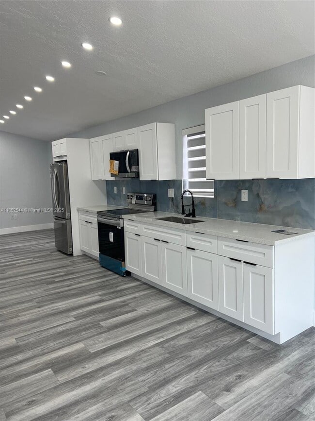 property at 10057 NW 127th St
