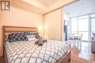 65-2065 Bremner Blvd in Toronto, ON - Building Photo - Building Photo