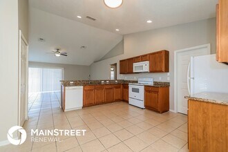 305 Puffer Ct in Poinciana, FL - Foto de edificio - Building Photo