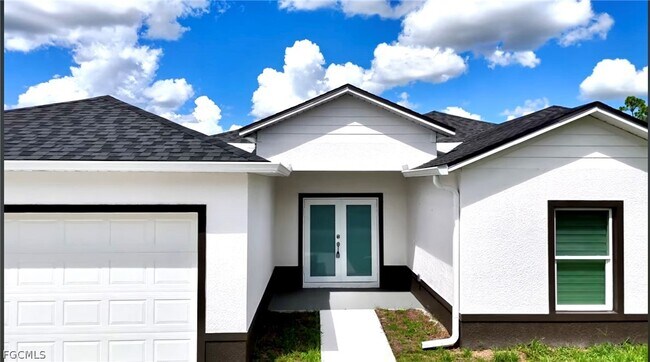 825 Porter St E in Lehigh Acres, FL - Building Photo - Building Photo