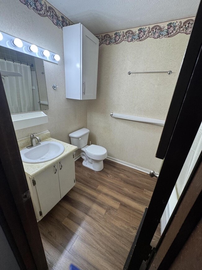 property at 201 Honeysuckle Ln