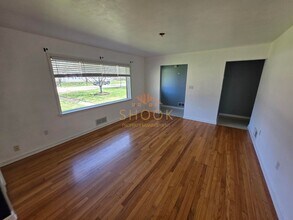 LARGER RANCH HOME WITH BASEMENT AND FENCED BACKYARD in West Lafayette, IN - Building Photo - Building Photo