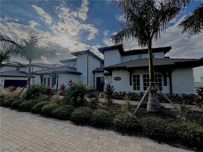 16885 Fairgrove Way, Unit 6-201 in Naples, FL - Foto de edificio - Building Photo