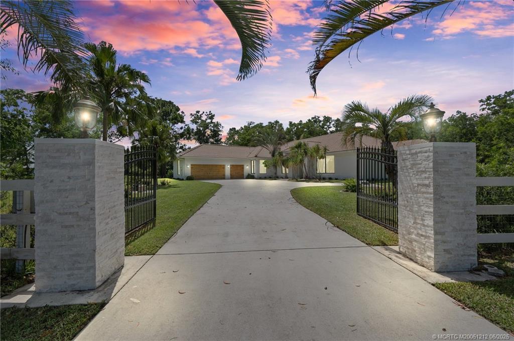 9856 SW Pueblo Terrace in Palm City, FL - Building Photo