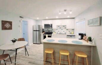 7605 Ridgewood Ave in Cape Canaveral, FL - Building Photo - Building Photo
