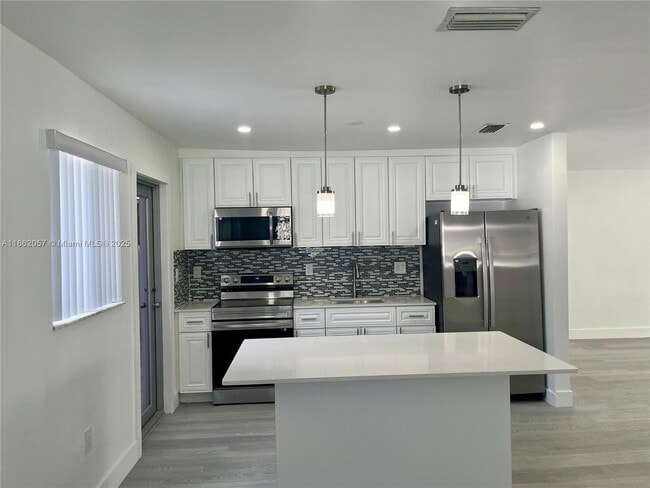 property at 7113 SW 21st St