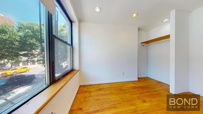 299 E 11th St