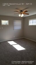 1003 Yanceyville St-Unit -Apt D in Greensboro, NC - Building Photo - Building Photo