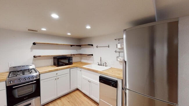 Bright South Park Hill basement apartment by William H McNichols Park in Denver, CO - Building Photo - Building Photo