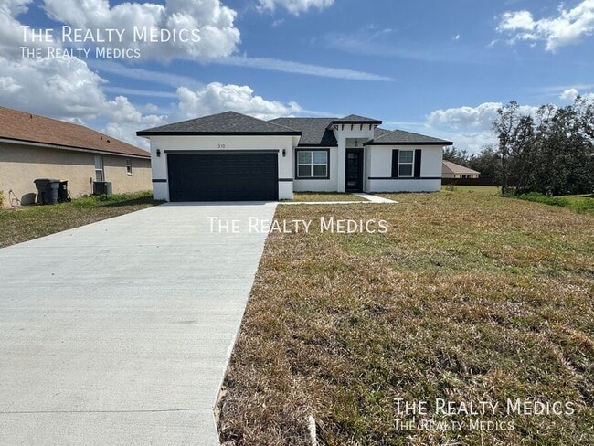 310 Dogfish Way in Poinciana, FL - Building Photo - Building Photo