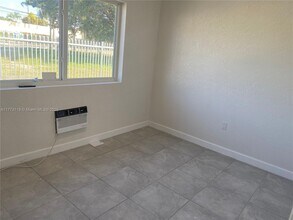 10030 W Indigo St in Miami, FL - Building Photo - Building Photo