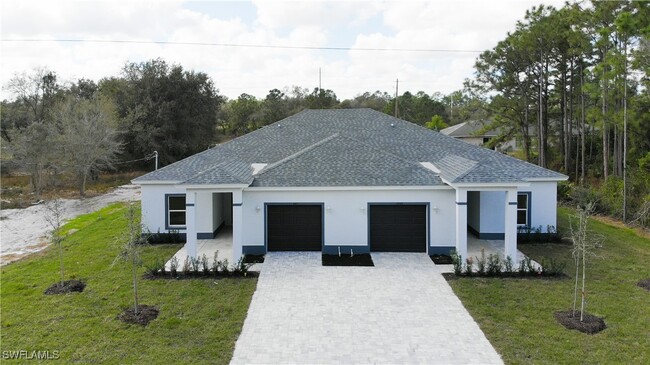 713 Jack Ave S in Lehigh Acres, FL - Building Photo - Building Photo