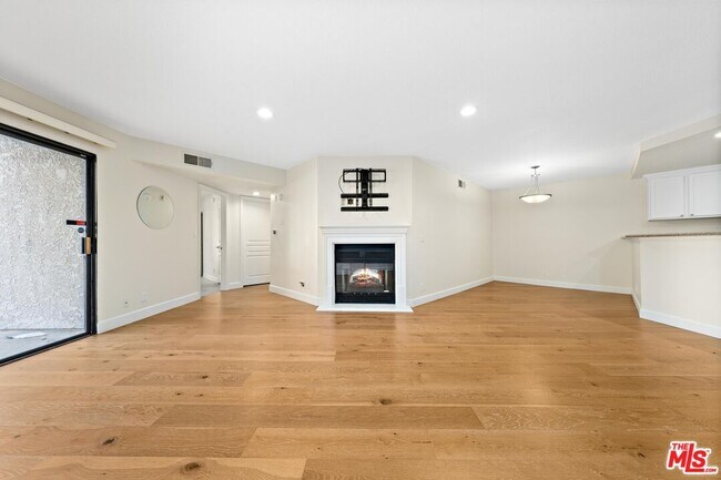 property at 1633 S Bentley Ave