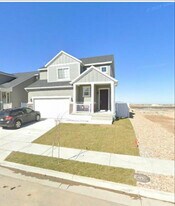 1044 W Osprey Dr in Stansbury Park, UT - Building Photo