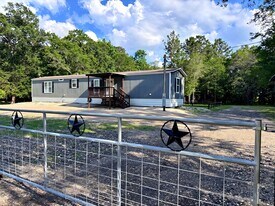 25 County Rd 3893 W in Cleveland, TX - Building Photo