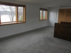 61 Pleasant St, Unit A in Meredith, NH - Building Photo - Building Photo