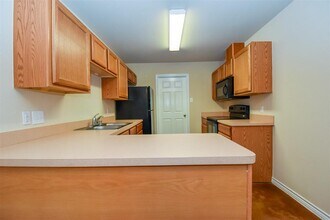 1103 Parkhurst Ave-Unit -A in Cleveland, TX - Building Photo - Building Photo