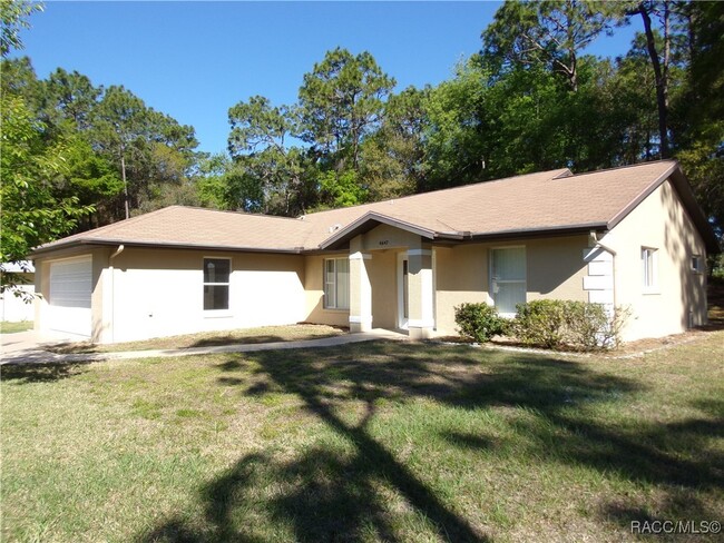 property at 6647 E Holly St