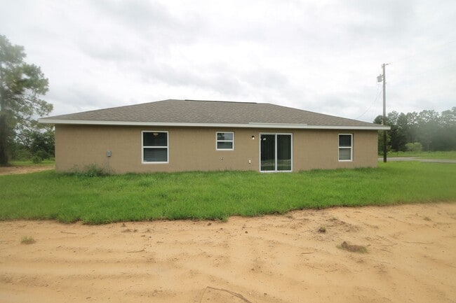 162 Malauka Run in Ocklawaha, FL - Building Photo - Building Photo