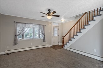 229 1/2 E 2nd St in Oswego, NY - Building Photo - Building Photo