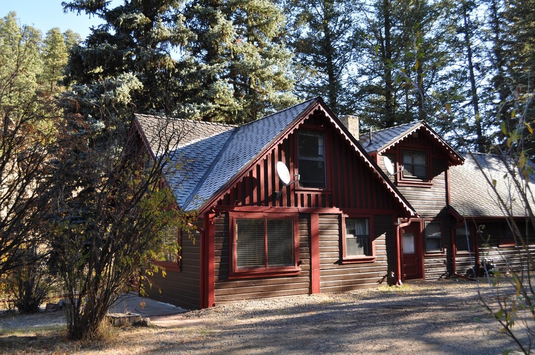 32074 Upper Bear Creek Rd in Evergreen, CO - Building Photo