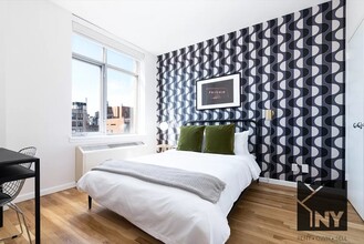 124 W 21st St, Unit 1502 in New York, NY - Building Photo - Building Photo